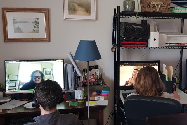 Two students who attend a Department of Defense Education Activity school in Vicenza, Italy, complete classwork from home through digital learning, April 28, 2020.