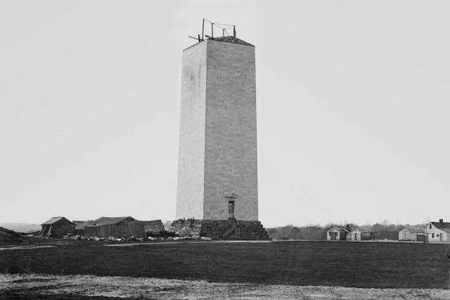 The Army Corps of Engineers built the Washington Monument, which opened in 1884. This image shows the monument as it was being constructed in 1860.