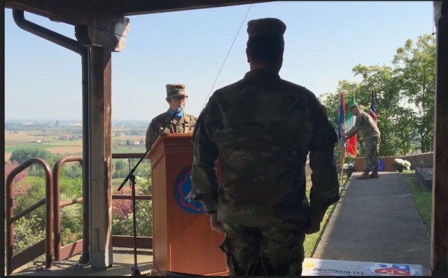 Col. Bryan M. Love, commander, 207th Military Intelligence Brigade --
Theater (MIB-T), stands at attention as Command Sgt. Maj. Michael Timme symbolically passes the colors, and  Sgt. Maj. Elsi InoaSantos, the brigade&#39;s operation sergeant major, narrates.  The
207th MIB-T  conducted the ceremony amid social distancing requirements of COVID-19, as Timme relinquished responsibility to Command Sgt. Maj. Kevin Austin. (Photo Credit: U.S. Army Spc. Tyberius Jones)