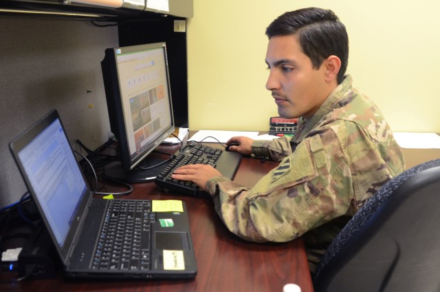 Spc. Derek Greaves, a public affairs mass communications specialist assigned to the 50th Public Affairs Detachment, Headquarters and Headquarters Battalion, 3rd Infantry Division, works on an assignment for the Basic Leader Course on Fort Stewart, Georgia, April 23, 2020. The Fort Stewart Noncommissioned Officer Academy recently transitioned BLC from a resident course to a virtual course due to the COVID-19 pandemic. (U.S. Army photo by Sgt. Zoe Garbarino)