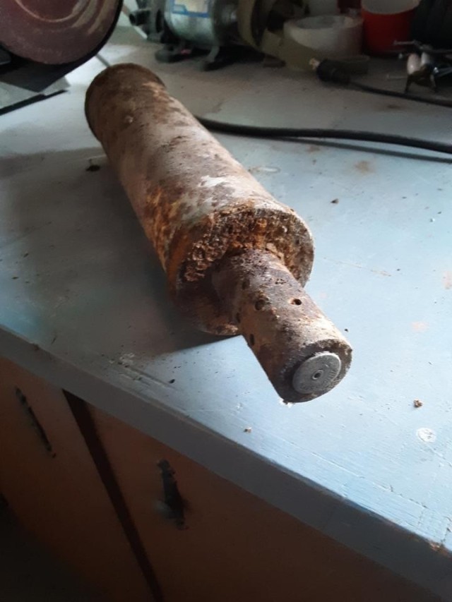 Inert Stokes mortar round found and picked up by a landowner on the Livingston Target Range cleanup site.  Establishing a relationship with landowners is the key to educating them about the potential risks of UXO and getting their permission to perform cleanup on their property.