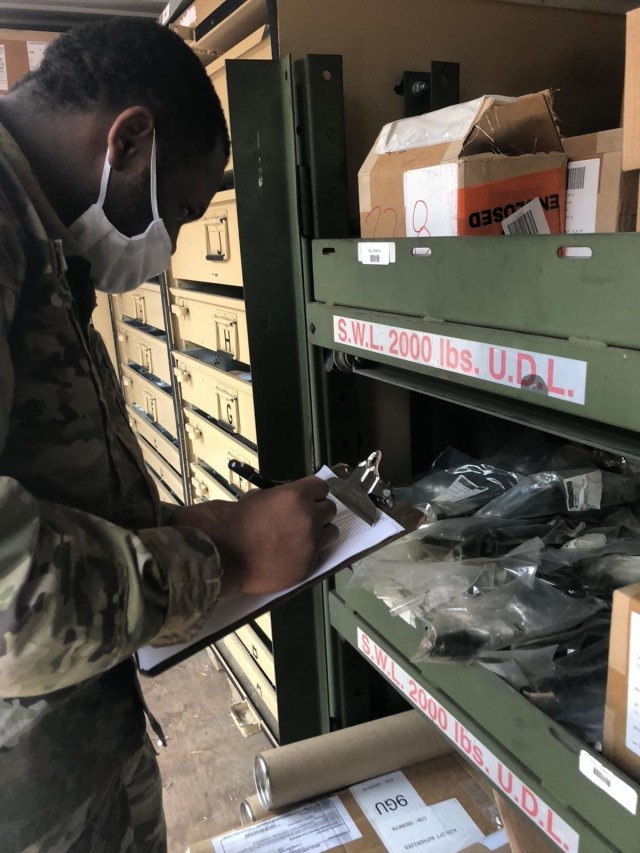 U.S. Soldier, assigned to the 2d Cavalry Regiment's Supply Support Area, conducts inventories in Vilseck, Germany, April 30, 2020. The SSA is responsible for receiving, inventorying, processing, distributing and disposing of the majority of the regiment’s office supplies and military equipment that is utilized by Soldiers and units, making its mission one of the most essential among any section within the regiment.