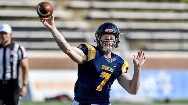 Cadet William Collins, University of Louisiana Monroe, looks to connect a pass during a football game.