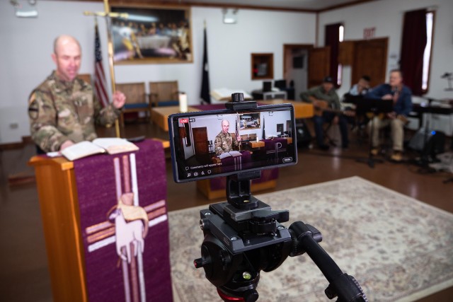 Lt. Col. Jacob Scott, a chaplain at KFOR 27 Regional Command East, livestreams a religious service from Camp Bondsteel Chapel, Kosovo, March 22, 2020. Services are typically done with a live audience every week by Army chaplains, but as a force protection measure against the COVID-19 risk, the worship was livestreamed to Soldiers.