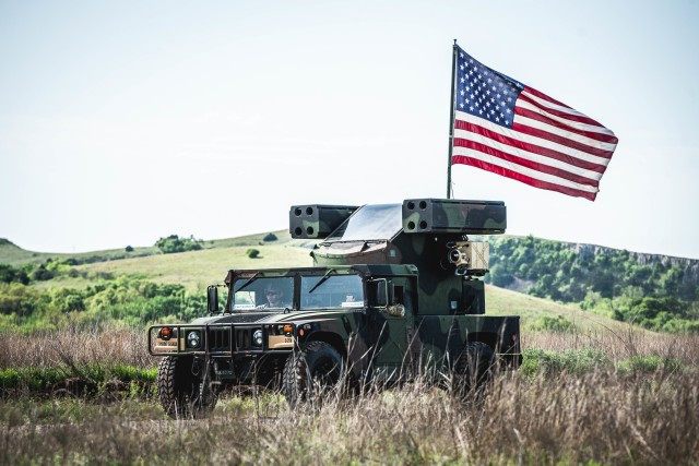 The flag that started American Flag Journey flies on the back of an Avenger on Fort Sill, Okla., April 24, 2020.  The flag belongs to Capt. Jordan D. Henrickson, the commander of Cerberus Battery, 5th Battalion, 5th Air Defense Artillery Regiment,...