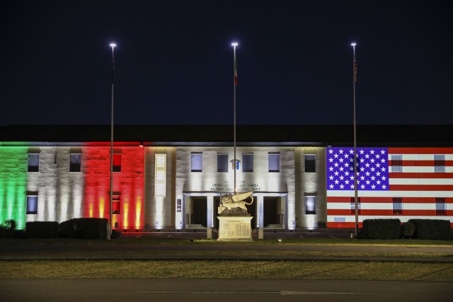 The U.S. Army Africa Headquarters Building on Caserma Ederle in Vicenza, Italy, is illuminated with the Italian and American flags May 3, 2020, as a sign of solidarity with Italy in combating the spread of the coronavirus. The ceremonial lighting...
