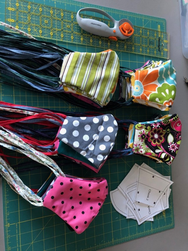 A few of the masks made by Master Sgt. Jennifer Davidson all sewn, and ready to be donated. (Photo credit Master Sgt. Jennifer Davidson)