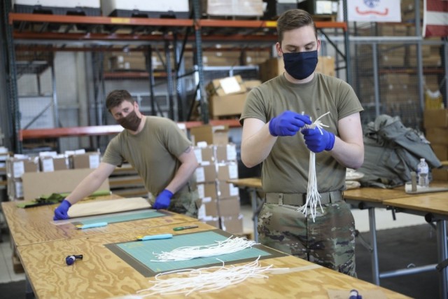 Indiana Guard Soldiers trade parachutes for sewing machines
