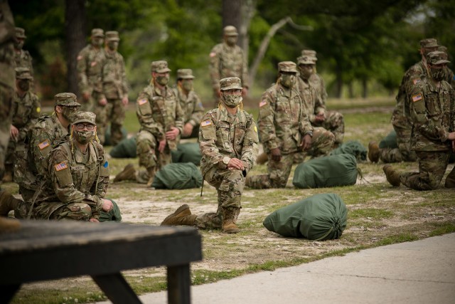 Newly arrived trainees to 2nd Battalion, 60th Infantry Regiment meet their
drill sergeants and receive instruction for wearing cloth face coverings
throughout their future training. Each trainee has been in quarantine for
two weeks before arriving to their training units to complete Basic Combat
Training. As part of the newly implemented 2 + 8 training measures, trainees
will be closely monitored for an additional two weeks to ensure they aren’t
exposed to the COVID-19 virus. Wake-up routines for trainees now include
personal hygiene, cleaning and sanitization of their living spaces and daily
temperature checks. (Photo by Saskia Gabriel)