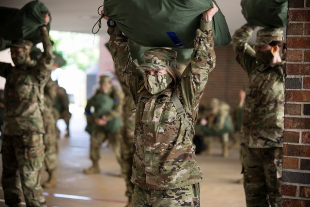 Newly arrived trainees to 2nd Battalion, 60th Infantry Regiment meet their
drill sergeants and receive instruction for wearing cloth face coverings
throughout their future training. Each trainee has been in quarantine for
two weeks before arriving to their training units to complete Basic Combat
Training. As part of the newly implemented 2 + 8 training measures, trainees
will be closely monitored for an additional two weeks to ensure they aren’t
exposed to the COVID-19 virus. Wake-up routines for trainees now include
personal hygiene, cleaning and sanitization of their living spaces and daily
temperature checks. (Photo by Saskia Gabriel)