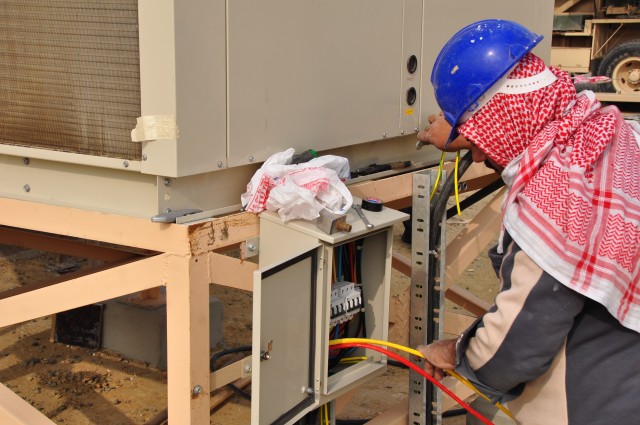 OC is a contract vehicle that provides an alternative method to fulfill requirements for sustainment, restoration, and modernization projects at the installation, post, camp or station level. TAM has used JOC task orders for work in Kuwait for more than 20 years including this Kuwaiti contract worker in 2011. (Photo credit Erickson Barnes)
