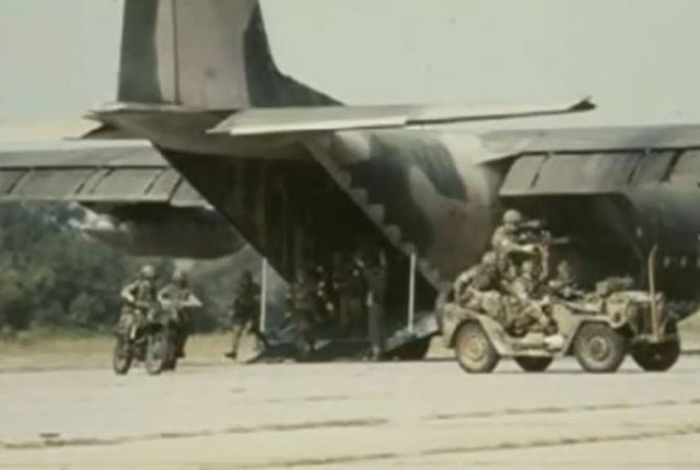 Rangers offload an aircraft on jeeps and motorcycles as part of Operation Eagle Claw.