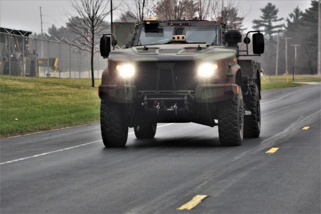 Soldiers drive a Joint Light Tactical Vehicle (JLTV) through the cantonment area April 23, 2020, at Fort McCoy, Wis. The JLTV family of vehicles is designed to restore payload and performance that were traded from light tactical vehicles to add...