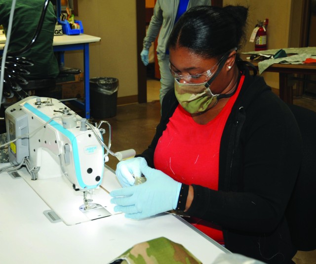 Bridgett Walker, Carol Morris and Katherine Berry, all textile production workers with Pine Bluff Arsenal’s Directorate of Chemical and Biological Defense Operations, make cloth face coverings for Soldiers and Civilians across Joint Munitions...