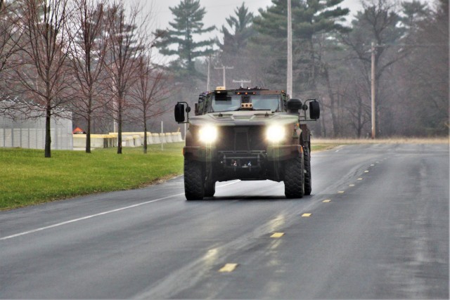 Soldiers drive a Joint Light Tactical Vehicle (JLTV) through the cantonment area April 23, 2020, at Fort McCoy, Wis. The JLTV family of vehicles is designed to restore payload and performance that were traded from light tactical vehicles to add...