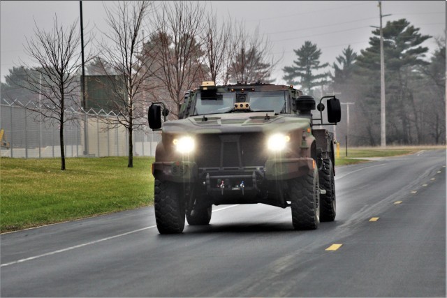 Soldiers drive a Joint Light Tactical Vehicle (JLTV) through the cantonment area April 23, 2020, at Fort McCoy, Wis. The JLTV family of vehicles is designed to restore payload and performance that were traded from light tactical vehicles to add...