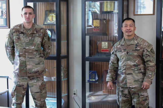 Pvt. Drake Tutt, an infantryman with D Company, 2nd Battalion, 27th Infantry Regiment, 3rd Infantry Brigade Combat Team, 25th Infantry Division is presented a coin from Command Sgt. Maj. Thinh Huynh, the brigade’s command sergeant major, at the...