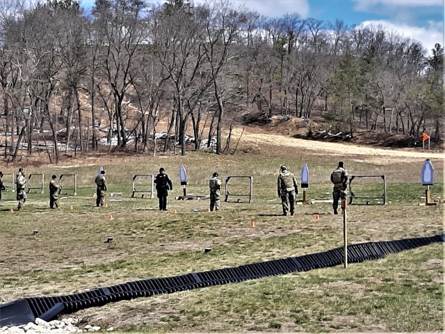 Soldiers are socially distanced while participating in augmented standby force training at a training range with the Directorate of Emergency Services Police Department on April 15, 2020, at Fort McCoy, Wis. Twenty-four Fort McCoy Soldiers...
