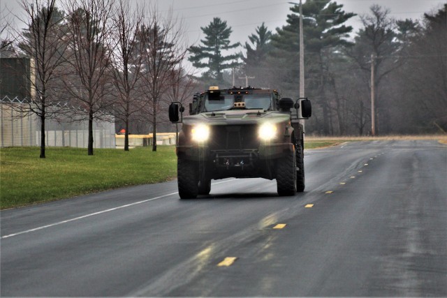 Soldiers drive a Joint Light Tactical Vehicle (JLTV) through the cantonment area April 23, 2020, at Fort McCoy, Wis. The JLTV family of vehicles is designed to restore payload and performance that were traded from light tactical vehicles to add...
