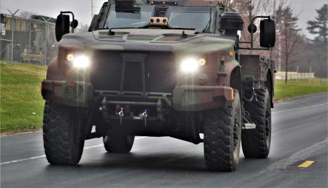 Soldiers drive a Joint Light Tactical Vehicle (JLTV) through the cantonment area April 23, 2020, at Fort McCoy, Wis. The JLTV family of vehicles is designed to restore payload and performance that were traded from light tactical vehicles to add...