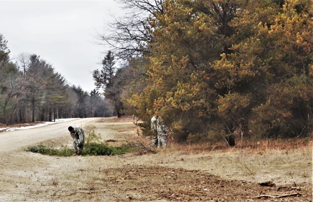 Students in Cold-Weather Operations Course (CWOC) Class 20-05 set up a bivouc area that includes an Arctic 10-person tent at a bivouac area during training March 16, 2020, on North Post at Fort McCoy, Wis. CWOC students are trained on a variety of...