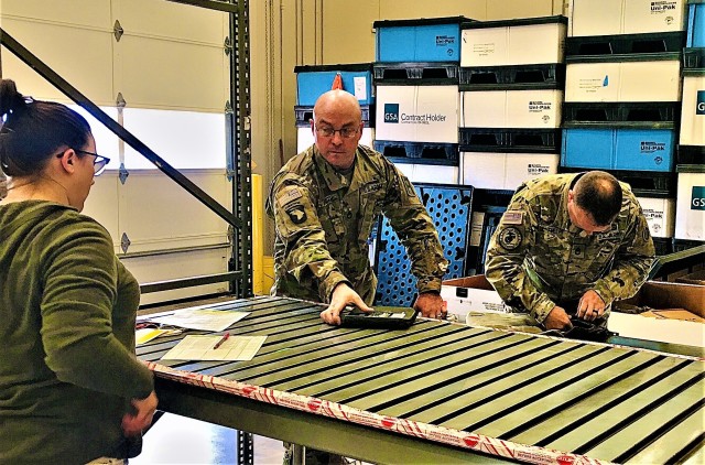 Warehouse Specialist Ashley Birks with the Fort McCoy Central Issue Facility completes sizing training with Soldiers with the 181st Multi-Functional Training Brigade on Feb. 12, 2020, at the facility at Fort McCoy, Wis. Four noncommissioned...