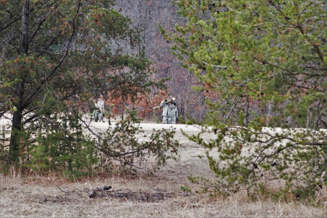 Students in Cold-Weather Operations Course (CWOC) Class 20-05 set up a bivouc area that includes an Arctic 10-person tent at a bivouac area during training March 16, 2020, on North Post at Fort McCoy, Wis. CWOC students are trained on a variety of...