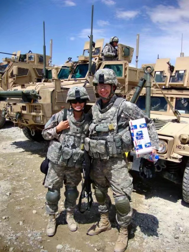 Then-Spc. Meirong Wang and Then-2nd Lt. Timothy Hughes make a mail run from Forward Operating Base Finley Shields to FOB Fenty in Jalalabad, Afghanistan for the 4th Brigade Special Troops Battalion, 4th Infantry Division in 2009.