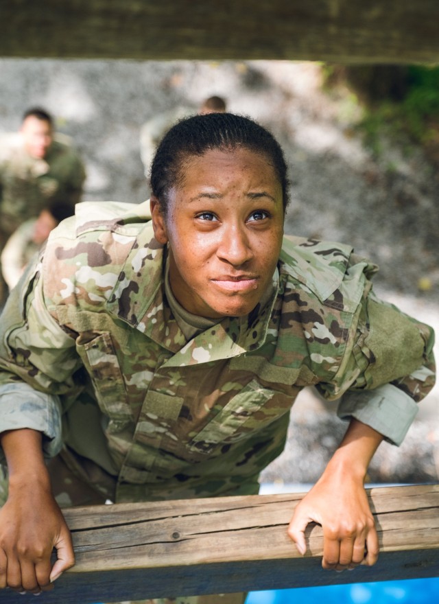 Cadet Briana Jones, from Lincoln University, attempts the Confidence Climb obstacle at the Confidence Course in Fort Knox, Ky., June 27, 2019.  The Confidence Course puts Cadets through physically challenging obstacles to build their confidence.