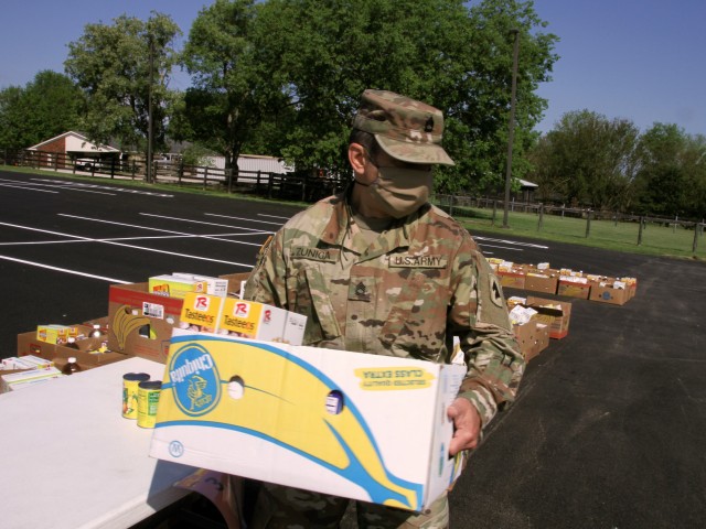 Kentucky National Guard helps distribute food to needy