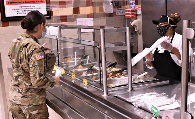 Essential to the effort: Quiet professionals serve meals to nation’s defenders