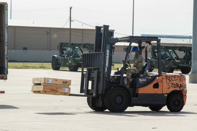 A Trooper with the 1st Cavalry Division Sustainment Brigade Wagonmasters organizes received parts at the Wagonmaster supply support activity warehouse, Fort Hood, Texas, April 29, 2020. (U.S. Army Photo by Sgt. Calab Franklin)