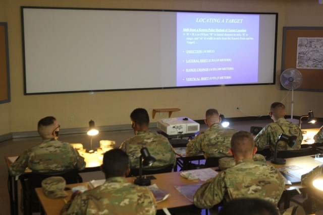 Soldiers in the 13F Fires Support Specialist military occupational specialty work through a lesson plan in the third week of their 10-plus week Advanced Individual Training school here. To comply with COVID-19 requirements, the Soldiers wore face...