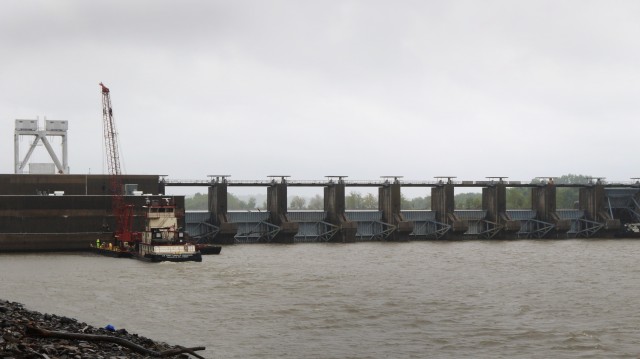 U.S. Army Corps of Engineers, Tulsa District maintenance crews working on the McClellan Kerr Arkansas River Navigation System, clean debris from the downstream side of the Webbers Falls powerhouse May 12, 2020.  Removing the debris helps ensure...