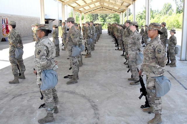 Soldiers from the Joint Readiness Training Center and Fort Polk’s 115th Field Hospital, 32nd Hospital Center, participate in a deployment ceremony May 6 prior to leaving in support of  Task Force Evacuare.