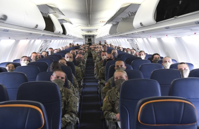 Initial Entry Training Soldiers wait on board their chartered aircraft to depart Columbia Metropolitan Airport in Columbia, S.C. for Fort Sam Houston Texas May 8.
