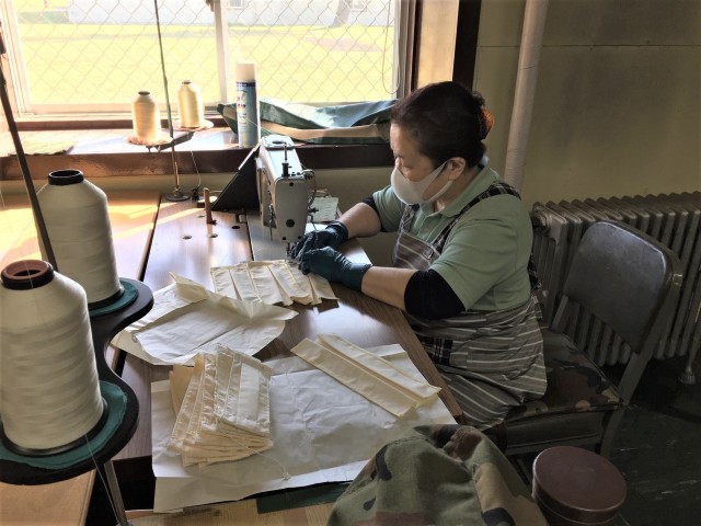 Kakizaki Mutsuko, lead sewer for the Japan Support Team, Army Field Support battalion-Northeast Asia, facemask fabrication effort, sews a mask. Her team has produced more than 1,700 of the coveted masks for USFJ. (Photo by Chief Warrant Officer 4 Brian Perinon, Japan Support Team, AFSBn-NEA)