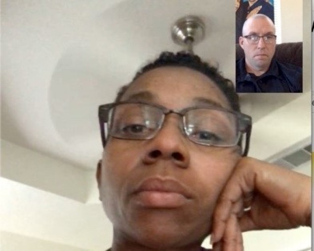Master Sgt. Trent Video-chats with his spouse La Shawn