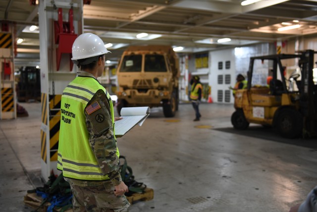 Sgt. Amanda Rovillo, 352nd Expeditionary Terminal Operations Element movement non-commissioned officer, inventories and verifies stow position of military vehicles on board the Liberty Passion at Naval Weapons Station, Joint Base Charleston in Support of DEFENDER-Europe 20 March 10, 2020. The United States Army Reserve unit is part of the Military Surface Deployment and Distribution Command’s total force team participating in the DEFENDER-Europe 20 exercises, deploying a division-size combat-credible force from the United States to Europe. (U.S. Army photo/Kimberly Spinner)