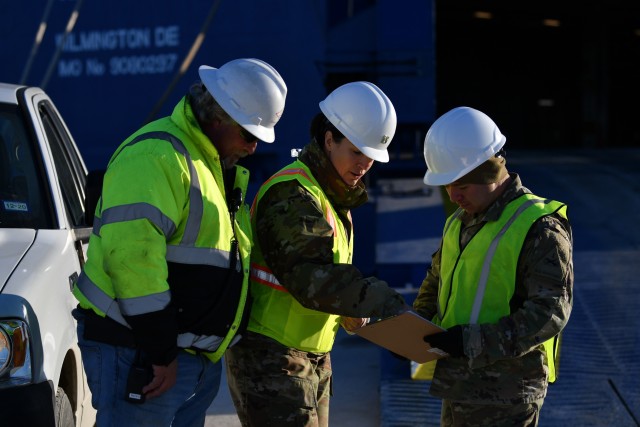 1st Armored Division discuss a stow plan for theM/V Resolve at the Port of Beaumont, bound for Germany in support of DEFENDER-Europe 20 Feb. 21, 2020. Exercises like this ensure the U.S. military will be able to dynamically project force to set the theater by mobilizing and deploying forces, sustaining them in a crisis and redeploying them when their mission is complete. 