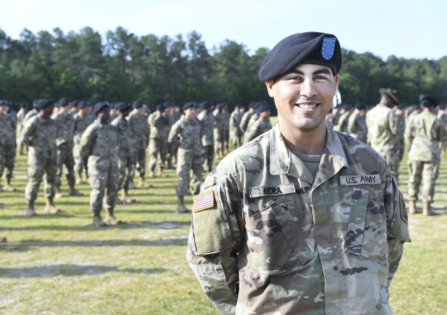 Pvt. Carlos Mora, a 21-year-old Puerto Rico native, smiles before his graduation from Basic Combat Training with the 4th Battalion, 39th Infantry Regiment on Fort Jackson. Mora and another Soldier were the first two trainees to graduate basic training after recovering from COVID-19.
