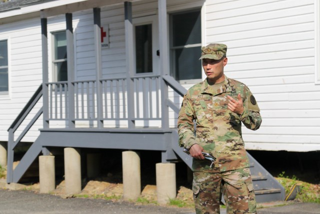 Maj. Will Pitt, medical officer in charge for the return of the Class of 2020, discusses the process to test the cadets for COVID-19 during a rehersal May 15. Each cadet will be tested for COVID-19 at Camp Buckner before being transported onto West Point.