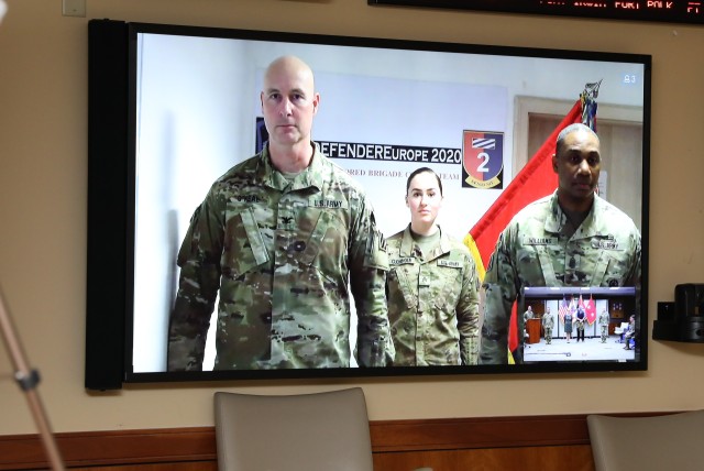 Col. Scott O’Neal left, commander of the 2nd Armored Brigade Combat Team, Sgt. Mary Cloninger and Command Sgt. Maj. Jabari Williams, senior enlisted leader of 2ABCT, virtually attend the award ceremony for the winners of 3rd Infantry...