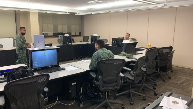 1SG John Martinez observes and evaluates one of the Ecuadorian students final presentation. A total of 35 students were able to complete the Common Faculty Development Instructor Course while the wait for clearance to return to their countries.