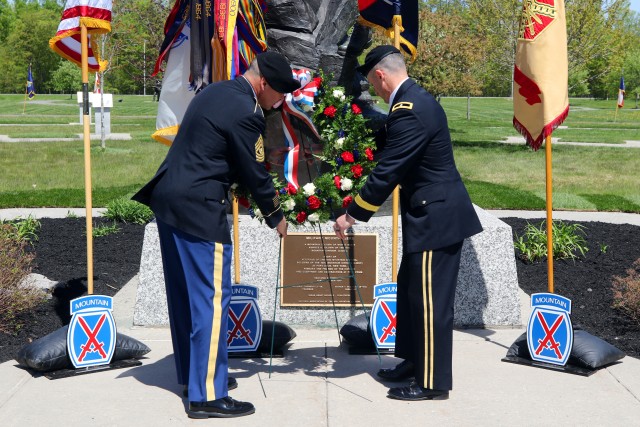 Brig. Gen. Brett Funck, 10th Mountain Division (LI) and Fort Drum&#39;s senior mission commander and Command Sgt. Maj. Mario Terenas, 10th Mountain Division&#39;s senior enlisted advisor, place a wreath at the foot of the Military Mountaineers’ Monument during the post&#39;s annual Memorial Day Ceremony on May 21, 2020. The ceremony was held to honor all of the fallen 10th Mountain Division Soldiers who gave their lives in defense of the values, liberties, and freedoms we cherish in the United States today. (U.S. Army photo by Pfc. Anastasia Rakowsky)