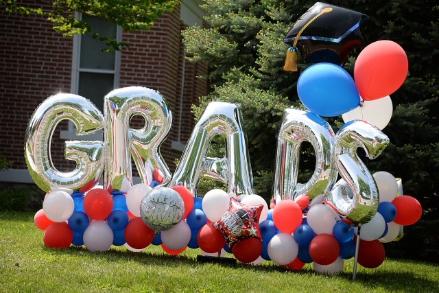 The front lawn of the Rainey residence was decorated for the graduation parade that culminated in front of the house at 1 Scott Avenue. The graduation parade celebrated graduating kindergartners, Patton Junior High School ninth-graders and area...