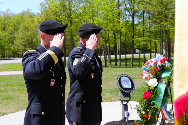 Brig. Gen. Brett Funck, 10th Mountain Division (LI) and Fort Drum&#39;s senior mission commander and Command Sgt. Maj. Mario Terenas, 10th Mountain Division&#39;s senior enlisted advisor, salute the wreath placed during the post&#39;s annual Memorial Day Ceremony on May 21, 2020. The wreath, placed at the foot of the Military Mountaineer’s Monument in Memorial Park, serves as a symbol of respect and appreciation for the Soldiers who have given their lives protecting the nation. (U.S. Army photo by Pfc. Anastasia Rakowsky)