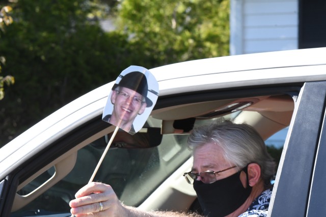 Colleagues, friends and family members surprise Randy Sitterly with a drive-by retirement parade at his home May 21 in Watertown, New York. Sitterly served 37 years in federal service, and spent more than 30 years employed at Fort Drum. He ended...