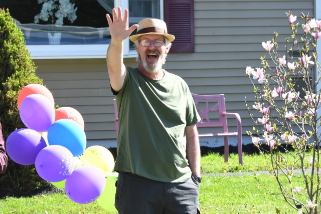Colleagues, friends and family members surprise Randy Sitterly with a drive-by retirement parade at his home May 21 in Watertown, New York. Sitterly served 37 years in federal service, and spent more than 30 years employed at Fort Drum. He ended...