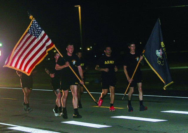 Soldiers of 2nd Battalion, 327th Infantry Regiment, 1st Brigade Combat Team, 101st Airborne Division (Air Assault), run at 12:04 a.m. May 22 on Fort Campbell, Kentucky. The No Slack Soldiers run for 24 hours to honor their fallen. 